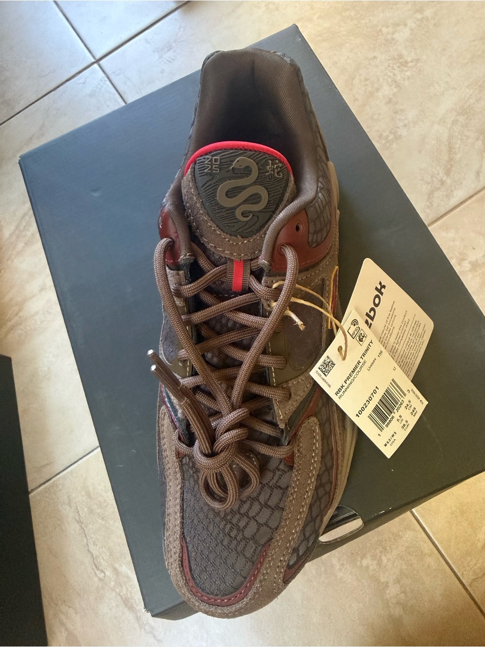 Reebok Men’s Brown Sneakers with Red Accent